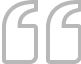 Gray quotation marks on a black background.