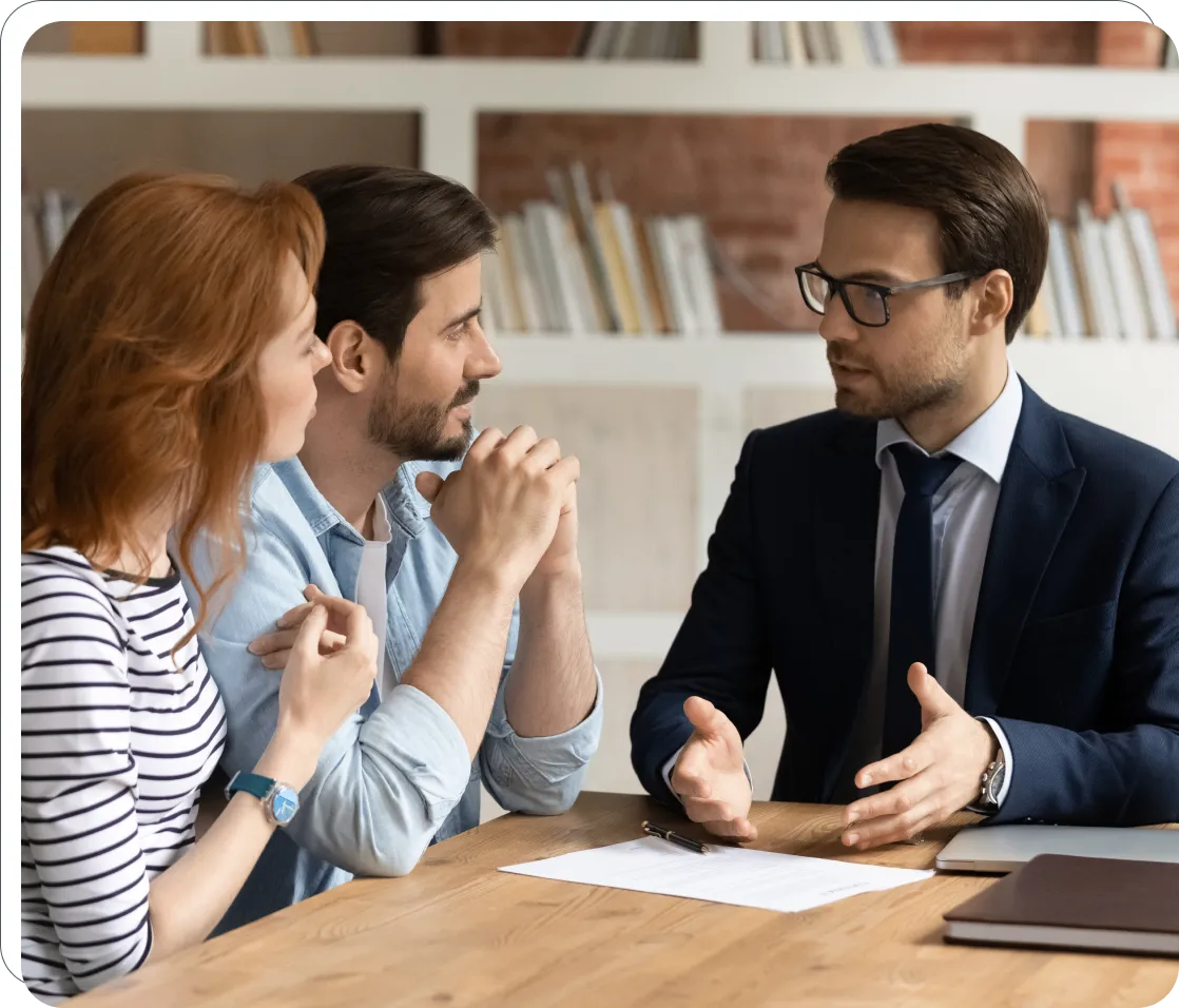 People having a discussion at a table.